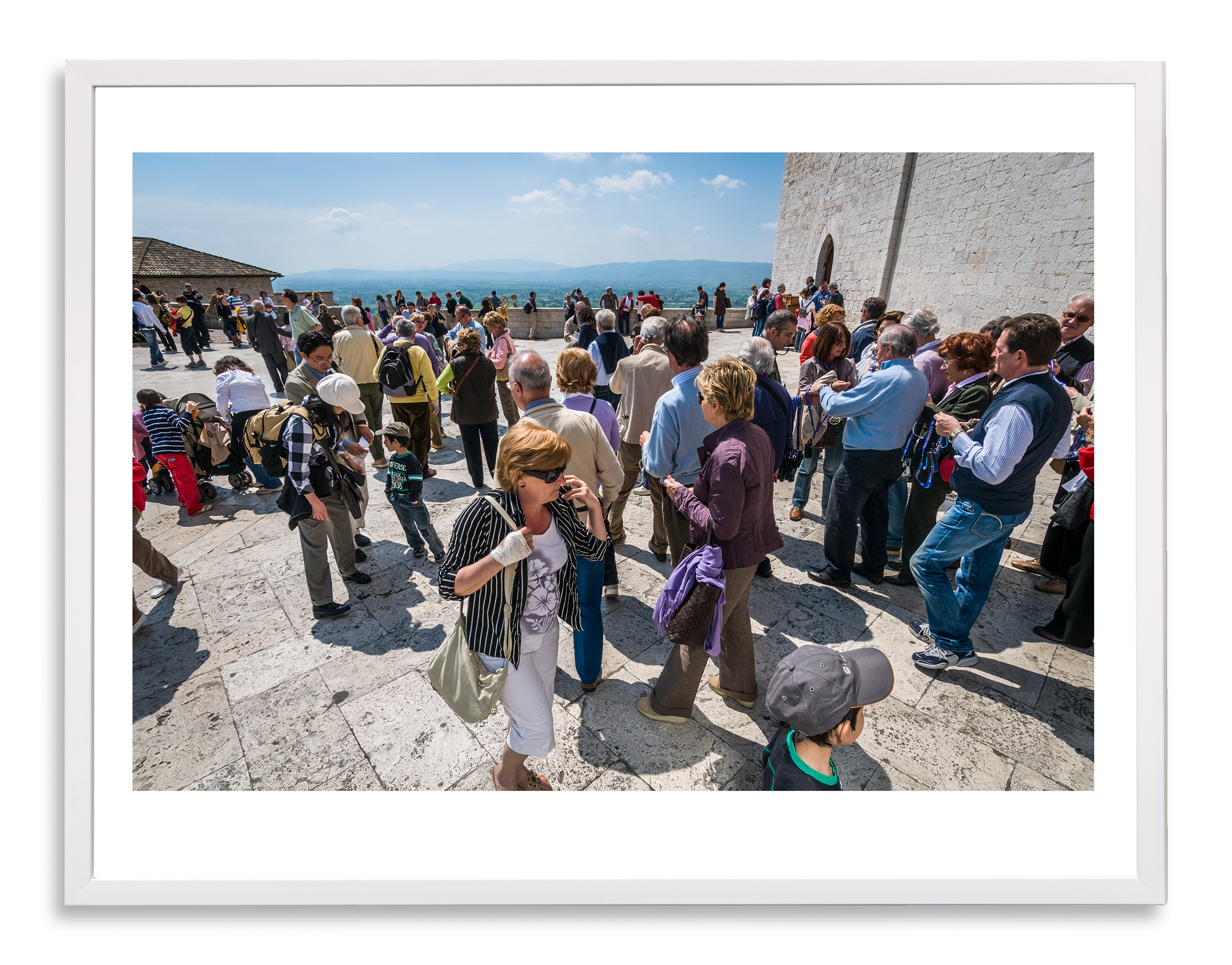 Assisi, menigte met vrouw en telefoon